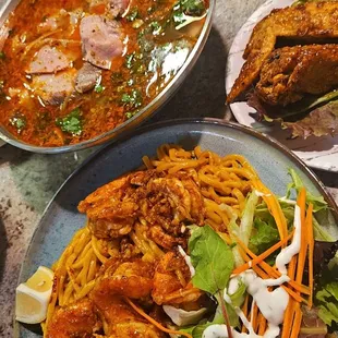 Cajun shrimp with garlic noodles, chicken wings, spicy lemongrass soup