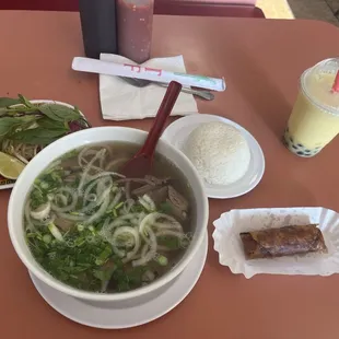 Well-done brisket pho, side of steamed rice, mango slush w/ boba