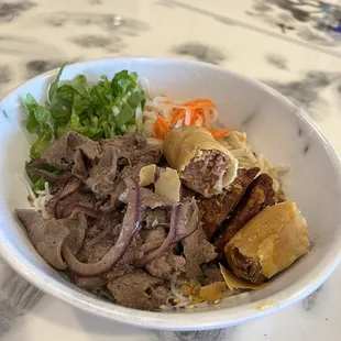 Beef bowl with egg roll