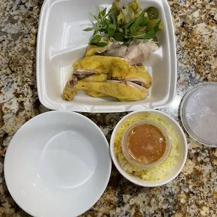 a plate of noodles and a bowl of soup