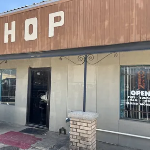 the front entrance of a restaurant