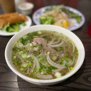 a bowl of soup and a plate of food