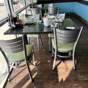 a table and chairs in a restaurant