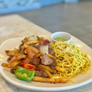 House Garlic Noodle with Shaken Filet Mignon Beef - Outstanding...except for the green bell peppers Lol  (super tender filet though)