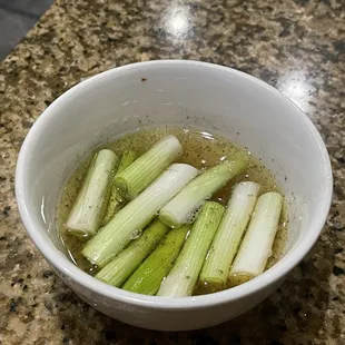 These green onions in oil are a must have condiment for me with any bowl of pho.   Be sure to ask for it.