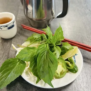 Fresh Crisp Thai Basil  Bean Sprouts  Sliced Jalapeños with Lime ‍ wedge
