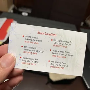 Back of business card showing the six locations