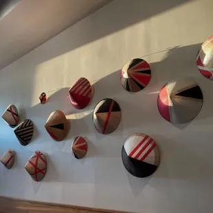 a wall of decorative objects