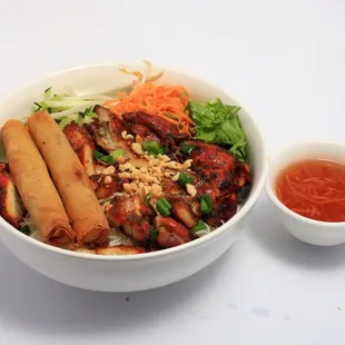 #70   Vermicelli with  grilled chicken and eggrolls  with homemade fish sauce