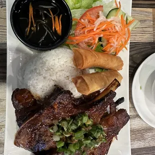 Rice with grilled pork, egg roll