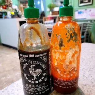 Lol sriracha and hoisin in a sriracha bottle