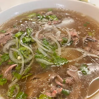 P12. Slices of Rare Steak Pho