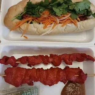 Combination Banh Mi w/ beef, chicken, and pork. Grilled chicken on stick.