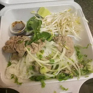 Not only do they charge extra per item for carryout - you see that they don&apos;t give you any meat in your pho! I asked for everything in it :(