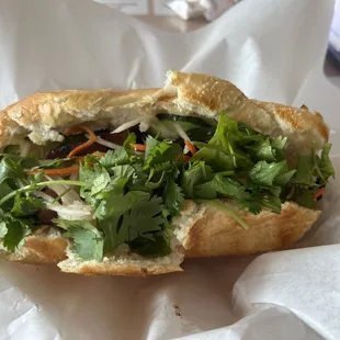 a close up of a sandwich in a wrapper