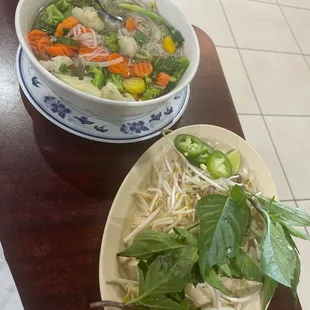 21. Pho Rau; Rice noodles soup with broccoli, cauliflower, and carrots.