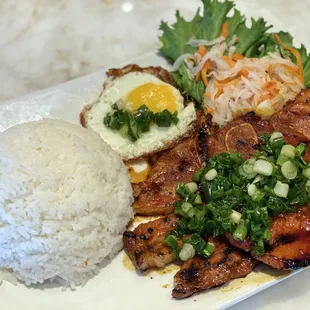 Charbroiled Pork Chop + Sunny Side Up Egg served with Rice