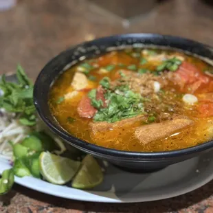 a bowl of soup on a plate