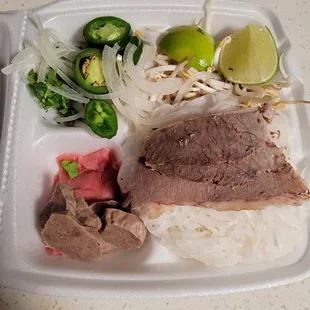 To go deluxe pho. Missing tendon as advertised on the menu. Small portion size for the price.
