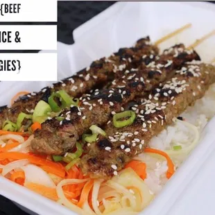 Lemongrass and honey marinated Cambodian beef sticks with pickled veggies and rice