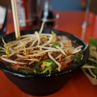 Chicken Pho with bean sprouts, Jalapeños, chilli oil, and shrimp.