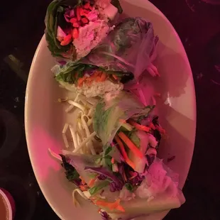Spring rolls with chicken and peanut sauce. Try it with the dank sauce, you won&apos;t regret it!
