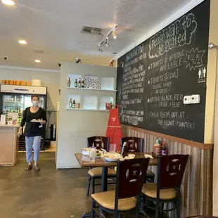 a restaurant with tables and chairs