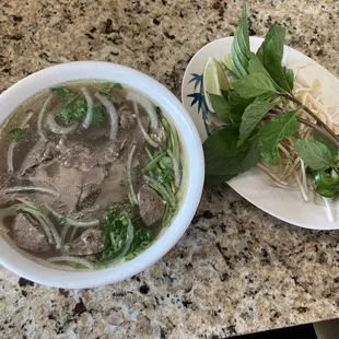 Pho with filet and meat balls.  Side of veggies- more available if you ask.