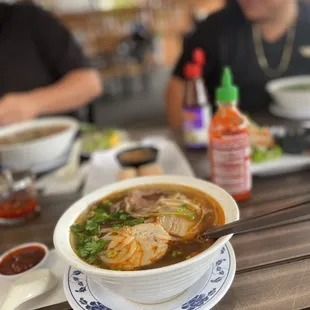 a bowl of soup and a plate of food