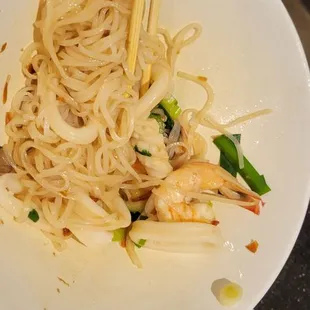 Rice noodle with squid and shrimp.