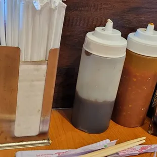 a number of condiments on a table