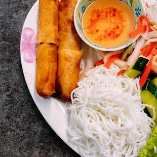 Appetizer: Spring Rolls comes with vermicelli, fresh lettuce, pickled carrots and radish some bean sprouts.DIY lettuce wrap.