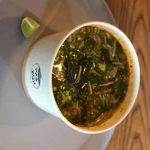 a bowl of soup on a plate