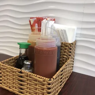 a basket of condiments