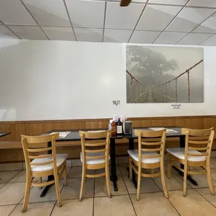 a table and chairs in a restaurant