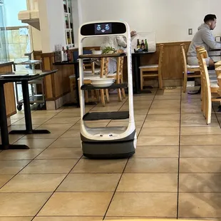 a robot in a restaurant