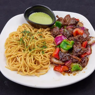 Shaken Filet Mignon with Garlic Noodles- tender filet mignon cubes wok-fired with red onions &amp; bell peppers