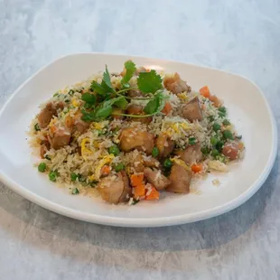 Crispy chicken stir fired with rice, fresh beaten eggs, peas, carrots and green onions.
