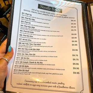 the menu for the noodle bar