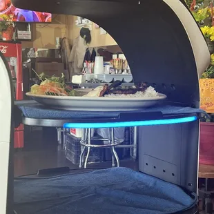 Please, take your food. Thank you. Have a good one.