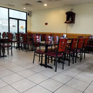 a restaurant with tables and chairs