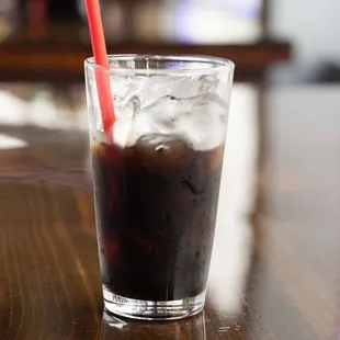 a drink in a glass with a straw