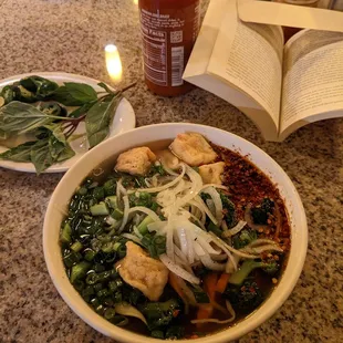 Medium veggie pho with veggie, spicy broth. Don&apos;t mind the lack of bean sprouts on the side; I already ate them all.