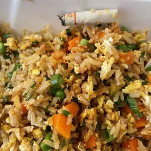 rice and vegetables in a styrofoam container