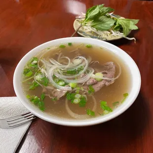 My Beef pho. Not sure what to do with the sprouts or the leaves.