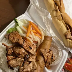 a chicken sandwich and rice