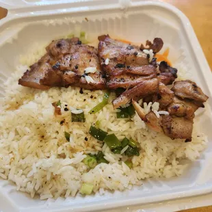 a meal in a styrofoam container