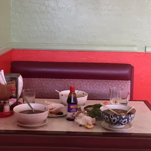 Dirty dishes left from previous customers.