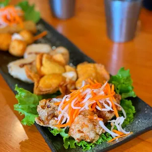 a platter of appetizers on a table