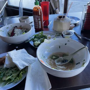 a bowl of soup and a plate of salad